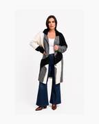 Saco largo tejido hueso y negro - Zara