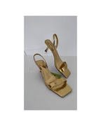 Sandalias serpiente metalizadas doradas - Mango